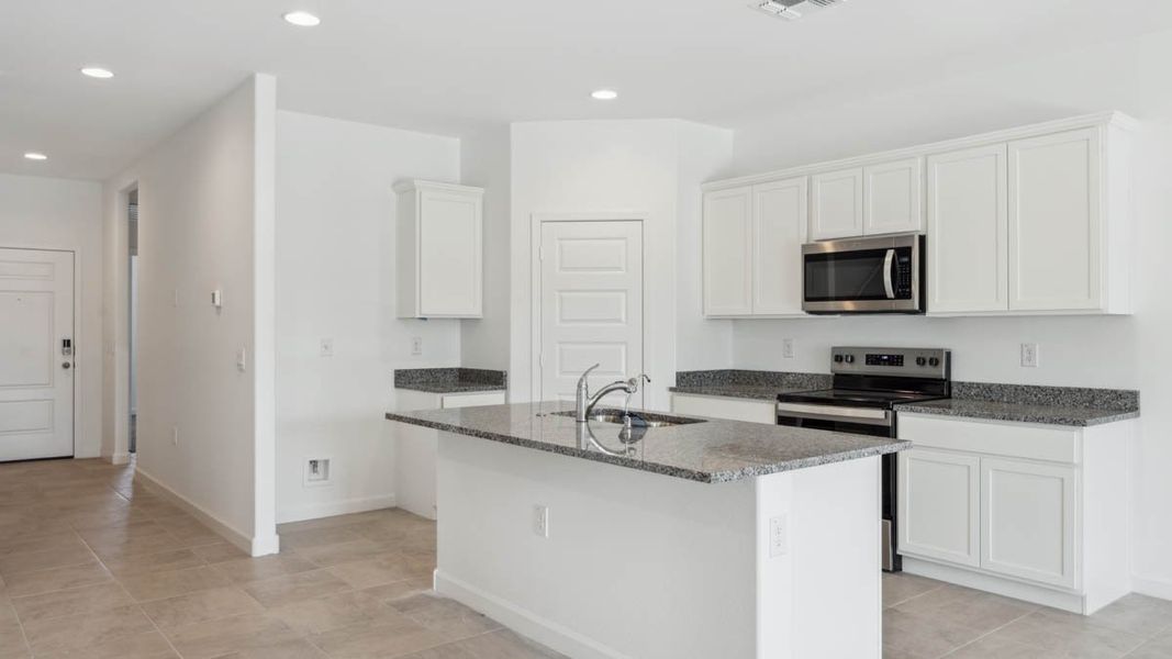 Representative furnished interior of a home built from the Mitchell by D.R. Horton in Upper Canyon, Phoenix (Image 8).