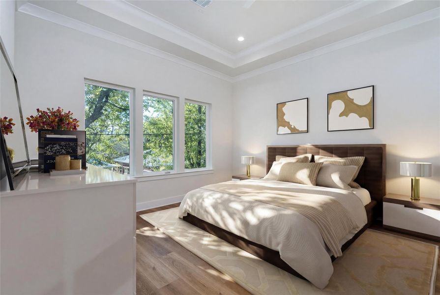 Virtually staged primary bedroom with vinyl flooring.