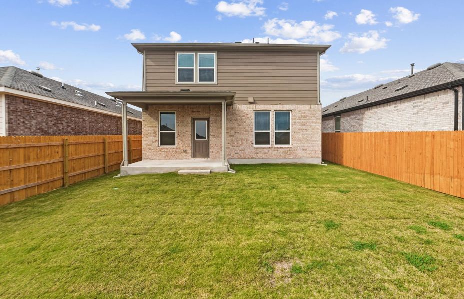 Exterior details and patio area of a home in Crosswinds, Kyle (Image 23).