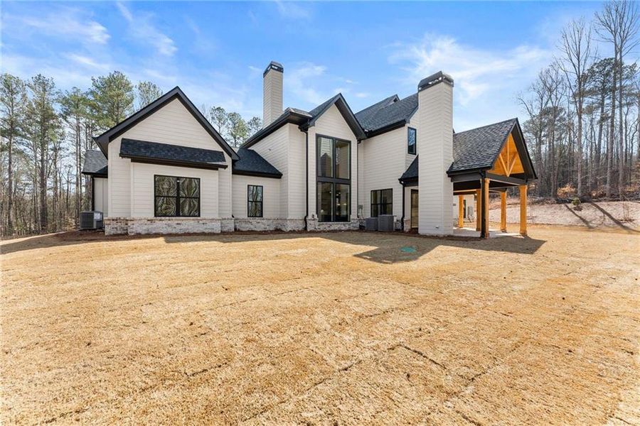 Front exterior of a new home in , Hoschton, GA, highlighting curb appeal (Image 29).