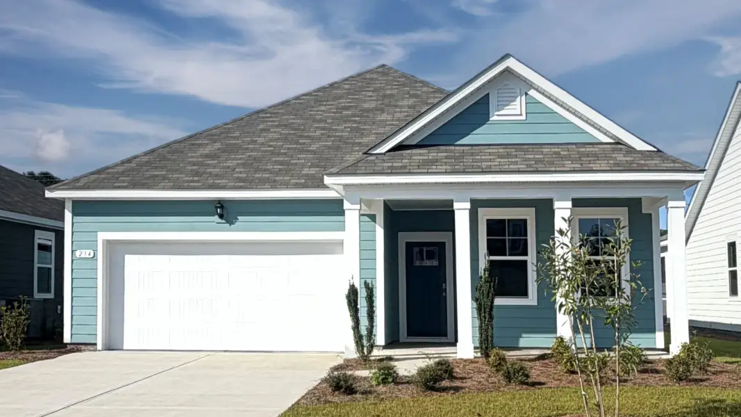 Front exterior of a new home in Carrington Woods, Longs, SC, highlighting curb appeal (Image 1). Front exterior of a new home in Carrington Woods, Longs, SC, highlighting curb appeal (Image 1).