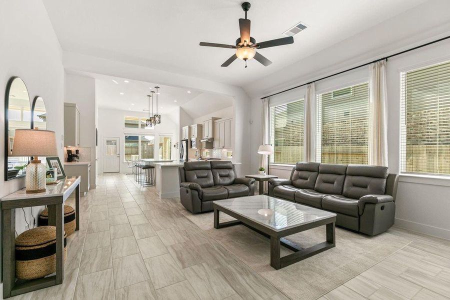 Flooded with light and space! The generous family room and adjacent kitchen feature continuous, hand-pickedlight tile that amplifies the home's open- concept design. Flooded with light and space! The generous family room and adjacent kitchen feature continuous, hand-pickedlight tile that amplifies the home's open- concept design.