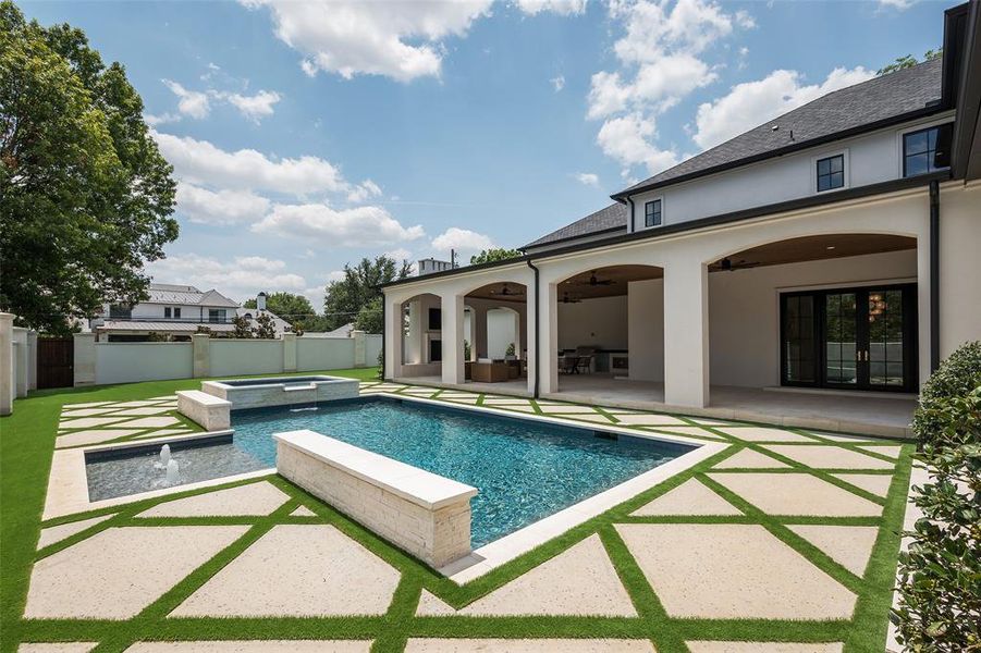 View of pool featuring an in ground hot tub, ceiling fan, and a patio area