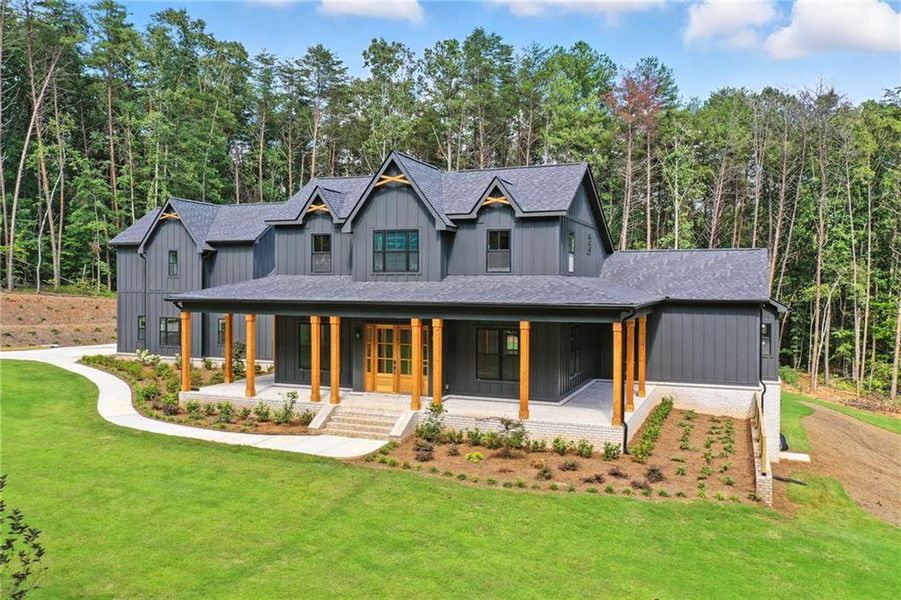 Front exterior of a new home in , Ball Ground, GA, highlighting curb appeal (Image 23).