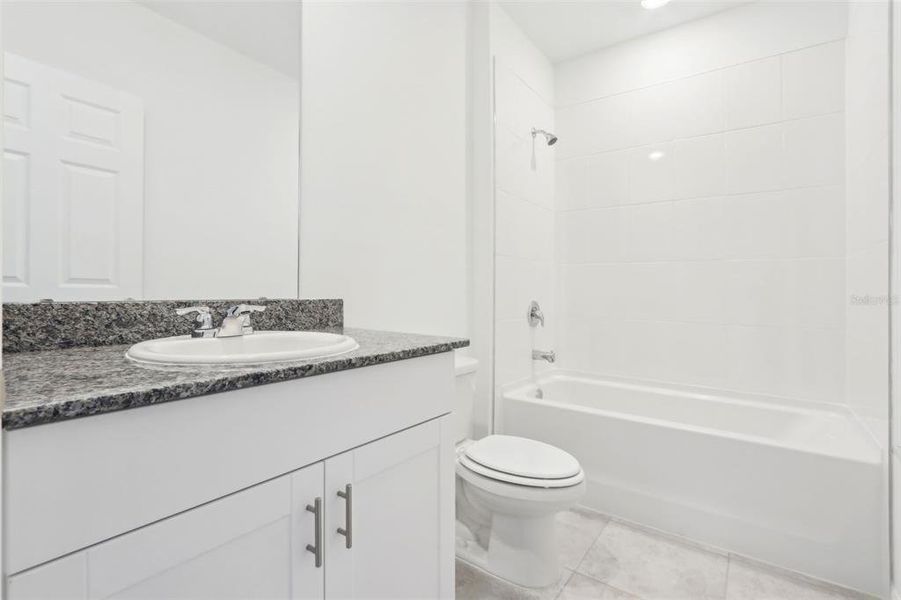 Furnished interior view inside a new home in Lawson Dunes - Signature Series, Haines City (Image 9). Furnished interior view inside a new home in Lawson Dunes - Signature Series, Haines City (Image 9).