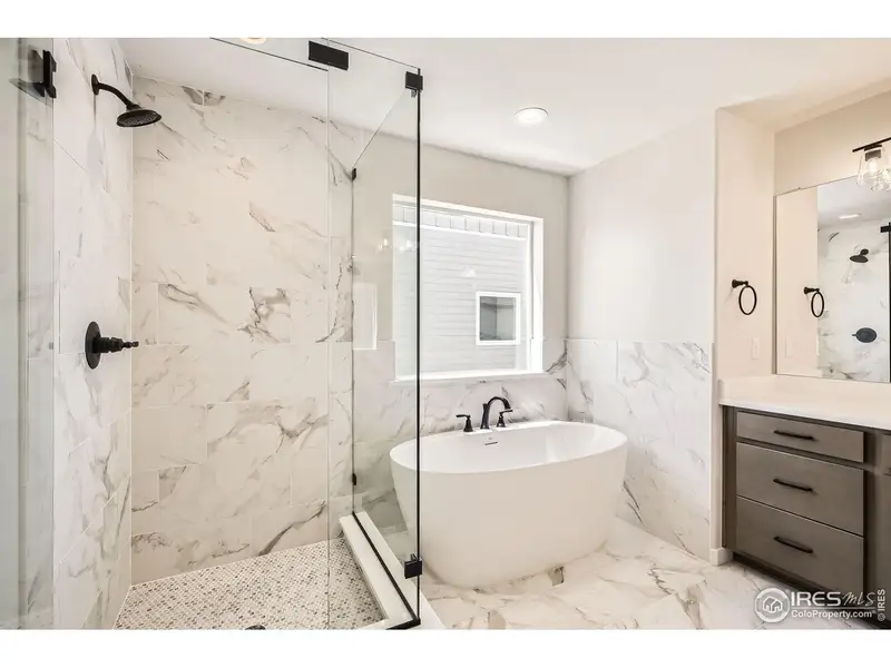Furnished interior view inside a new home in RainDance, Windsor (Image 12).
