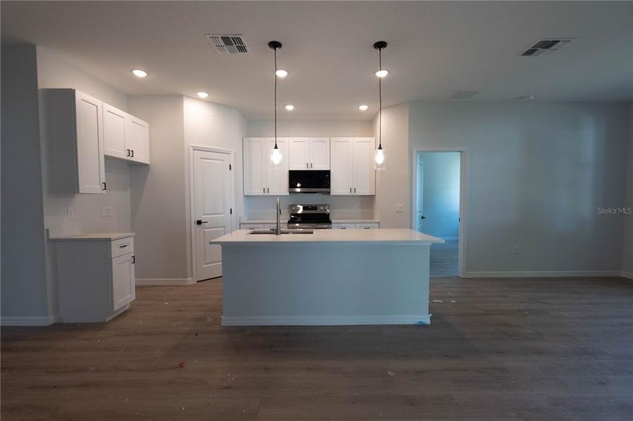 Furnished interior view inside a new home in , Tavares (Image 12).