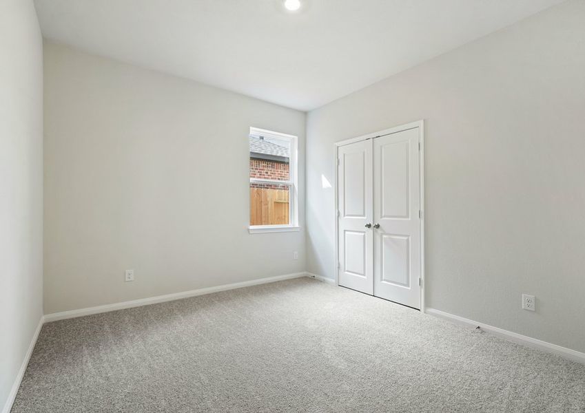 Secondary bedroom with lush carpet Secondary bedroom with lush carpet