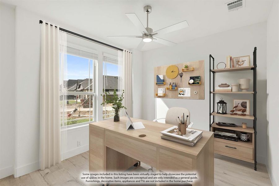 Home office with light wood desk, pegboard wall organizer, open shelving, and ceiling fan
