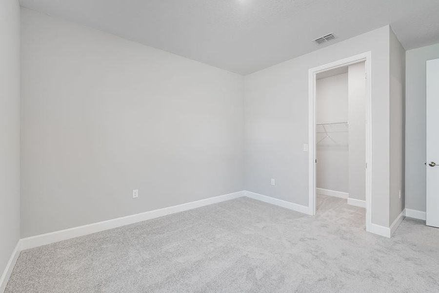 Representative unfurnished interior of a home built from the Maui by Taylor Morrison in Timber Ridge, Plant City (Image 12).