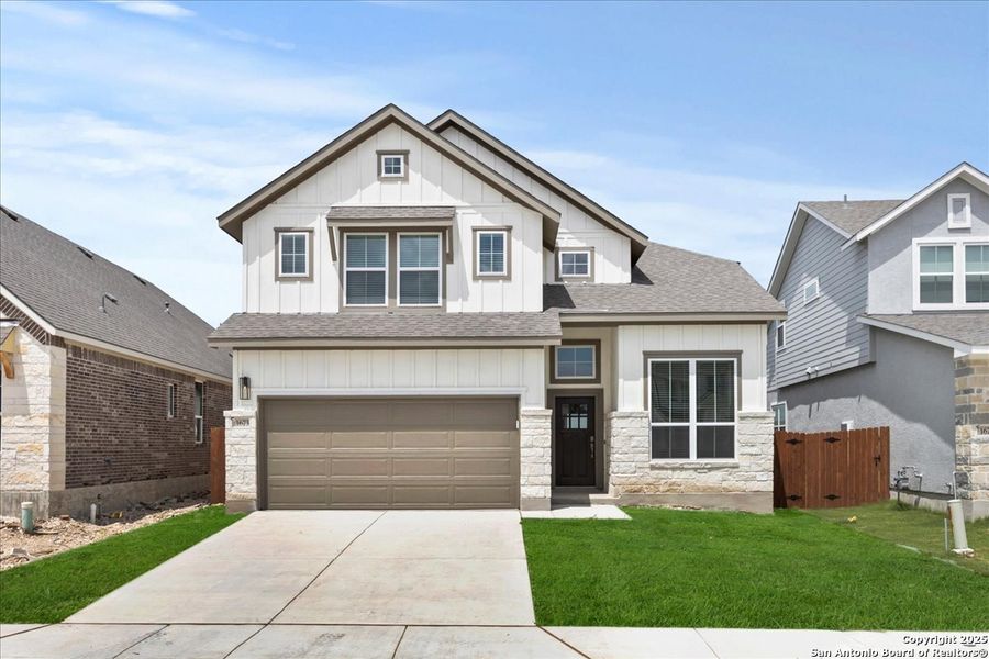 Front exterior of a new home in Meyer Ranch, Canyon Lake, TX, highlighting curb appeal (Image 12).