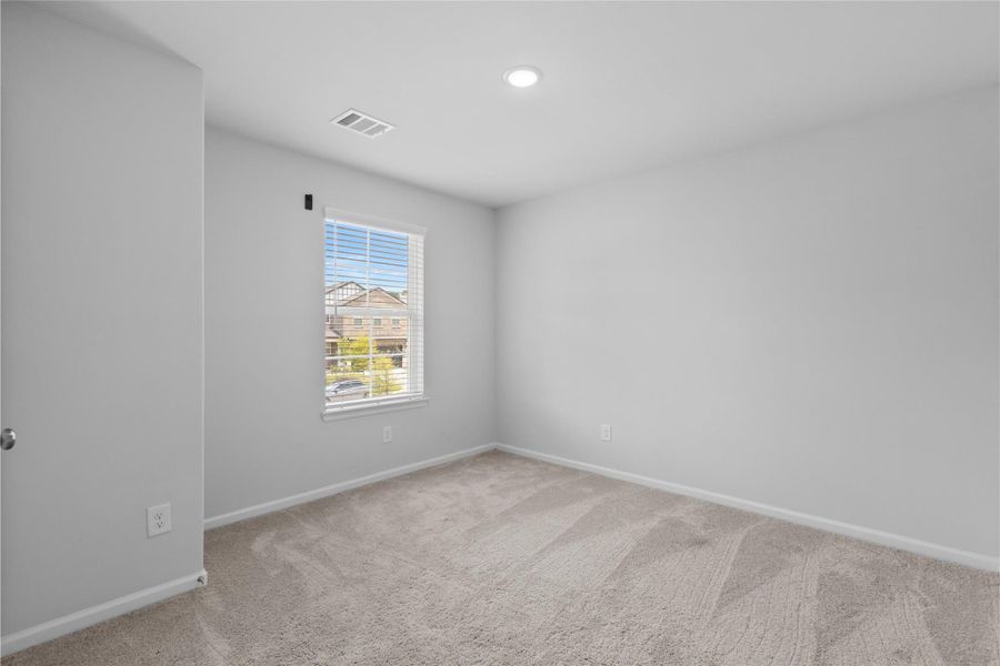 Spacious, unfurnished interior of a new home in Lakes at Black Oak, Magnolia (Image 21).