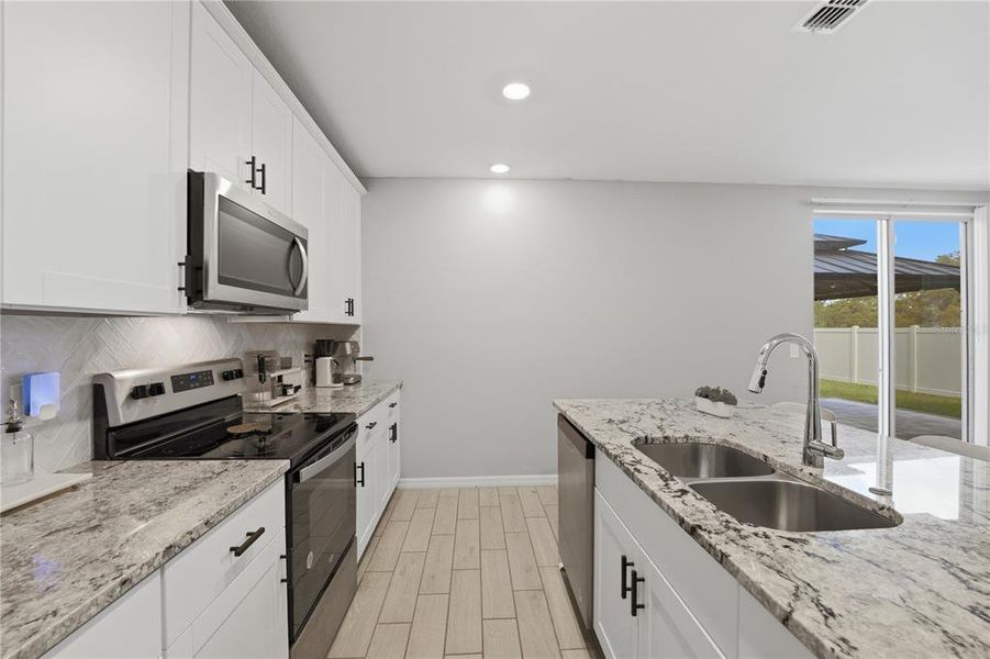 Furnished interior view inside a new home in , Davenport (Image 11).