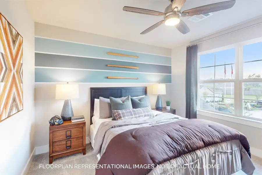 Furnished interior view inside a new home in Pinewood at Grand Texas, New Caney (Image 5).
