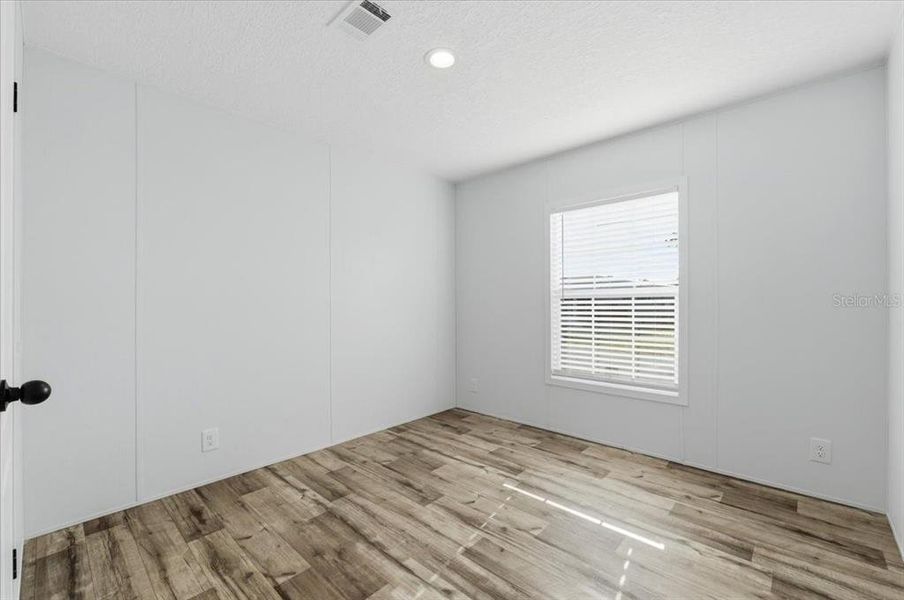 Spacious, unfurnished interior of a new home in , Port Richey (Image 9).