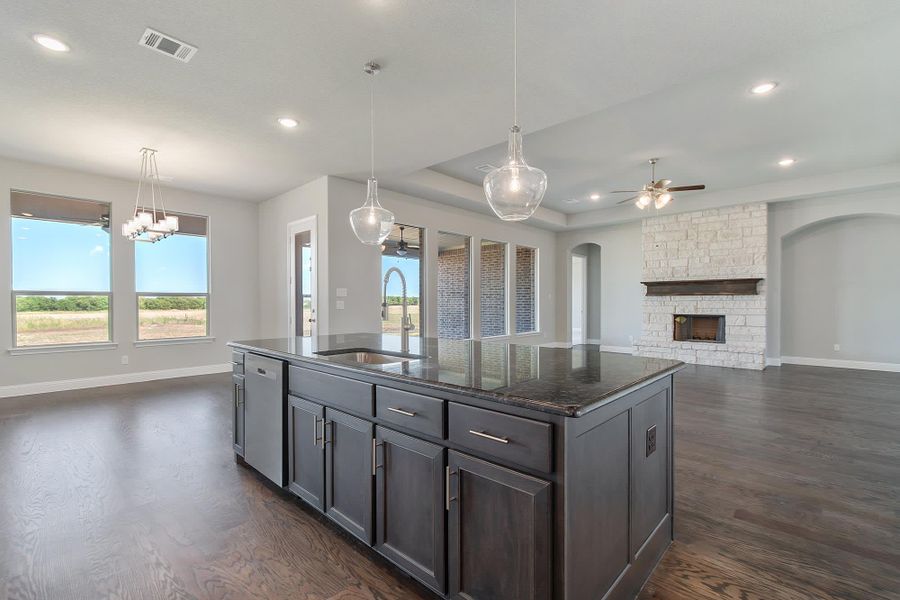 Kitchen & Family Room | Concept 3634 at Hidden Creek Estates in Van Alstyne, TX by Landsea Homes