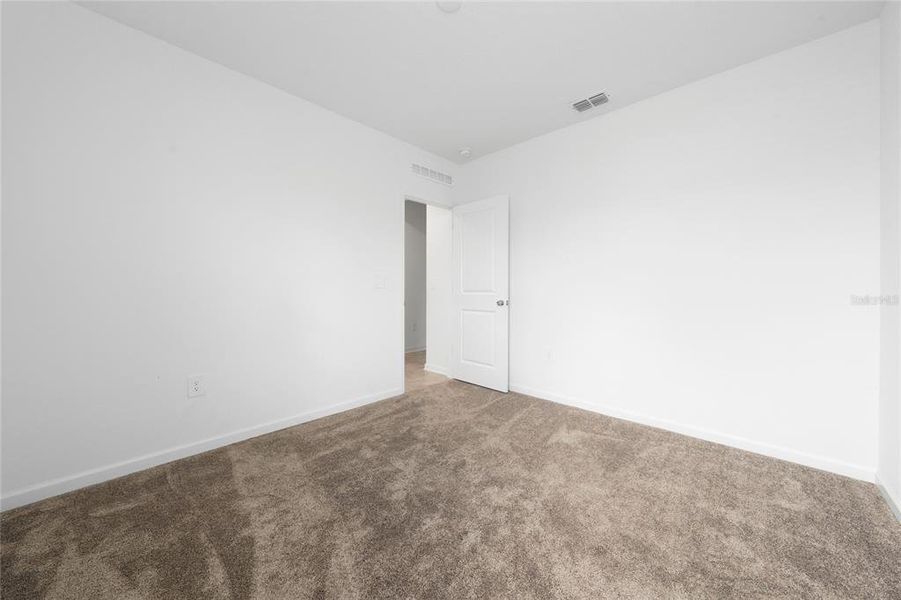 Spacious, unfurnished interior of a new home in Lawson Dunes, Haines City (Image 22).