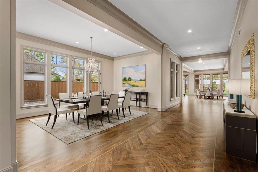 Plan your next dinner party under a designer chandelier in the spacious formal dining room nestled alongside the entry gallery.