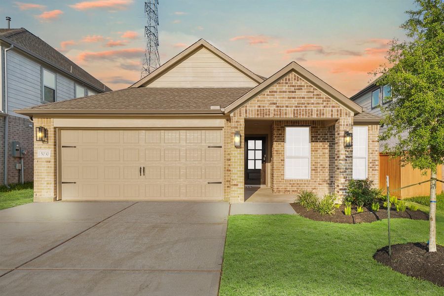 Front exterior of a new home in Sunterra North, Katy, TX, highlighting curb appeal (Image 8). Front exterior of a new home in Sunterra North, Katy, TX, highlighting curb appeal (Image 8).
