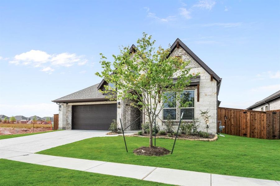 Front exterior of a new home in Addison Hills, Cedar Hill, TX, highlighting curb appeal (Image 2).