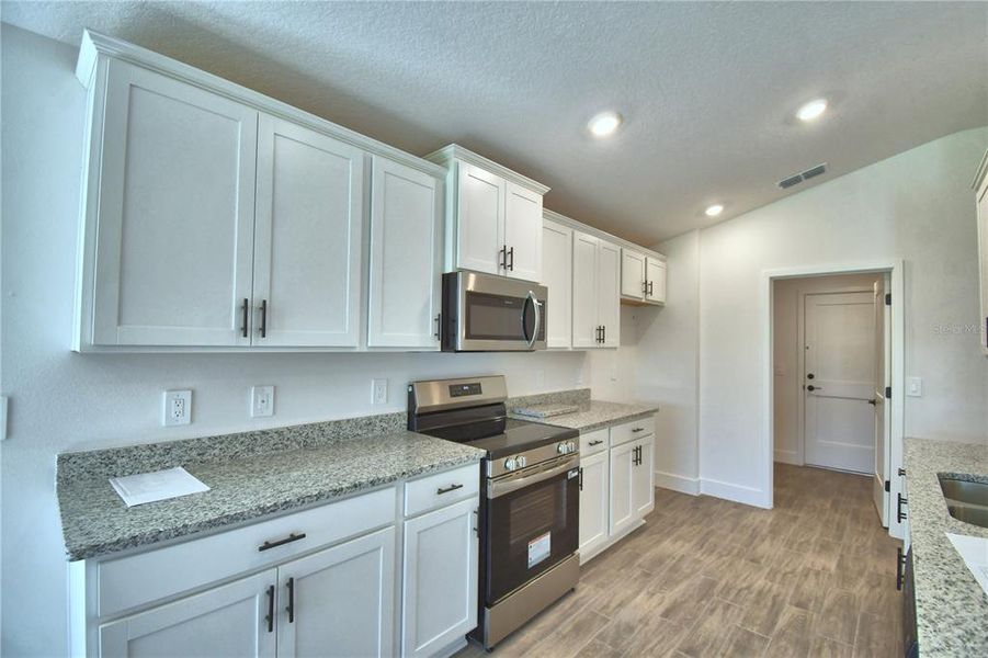 Furnished interior view inside a new home in Lake Juliana Estates, Auburndale (Image 5).