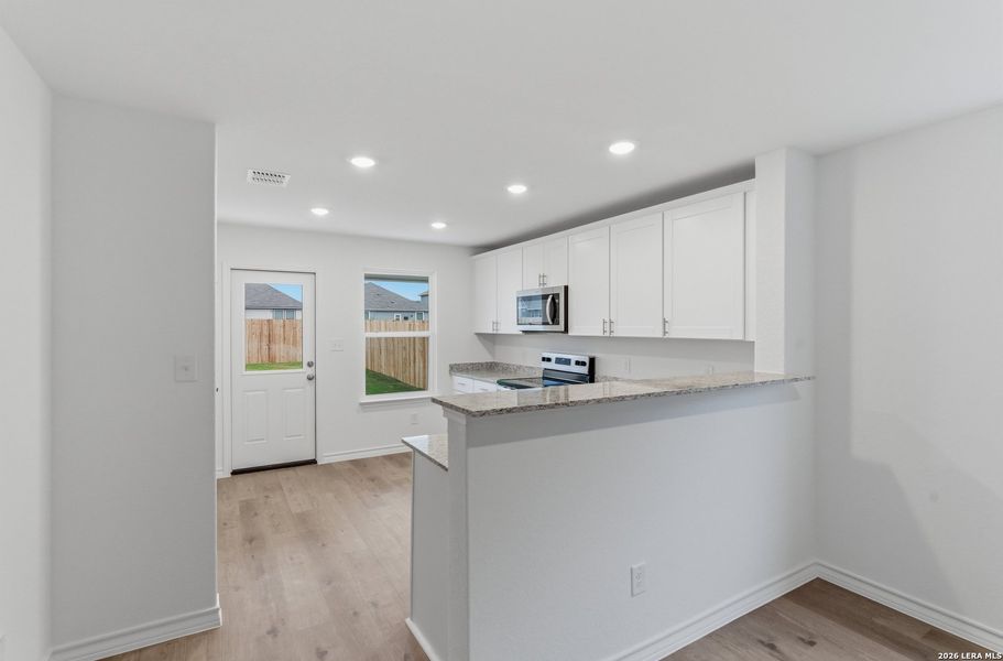 Furnished interior view inside a new home in Dove Song, Marion (Image 7).