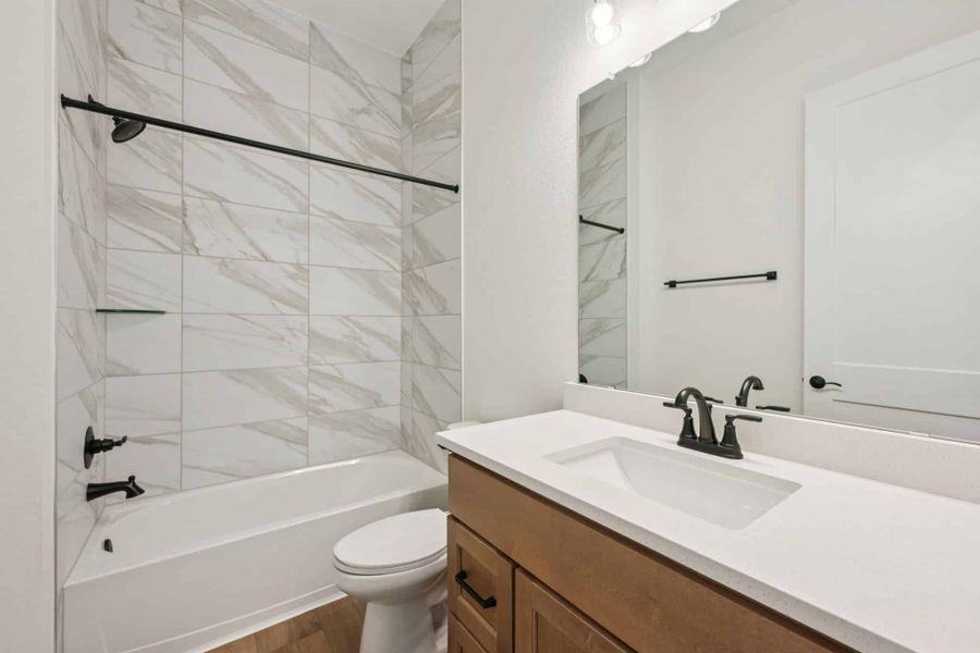 Furnished interior view inside a new home in The Woodlands Hills, Willis (Image 10).