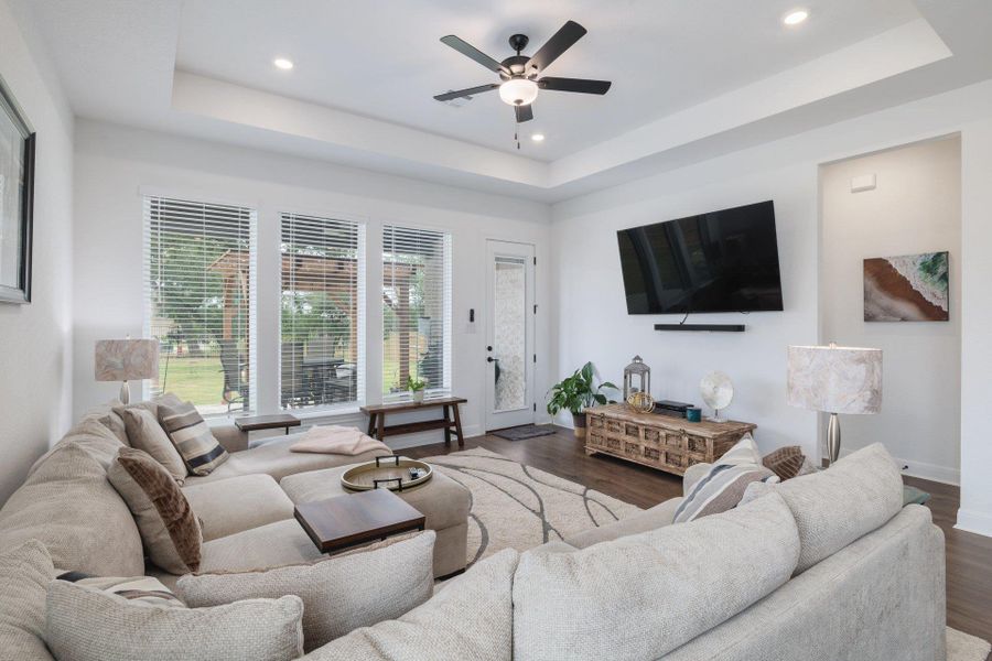 Generous living room looks onto the yard, backing to greenspace. Generous living room looks onto the yard, backing to greenspace.