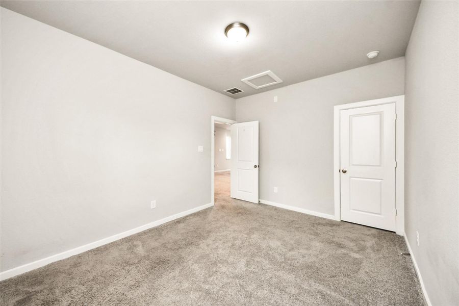 Additional bedroom featuring comfortable proportions, neutral tones, and a fresh, modern feel throughout.