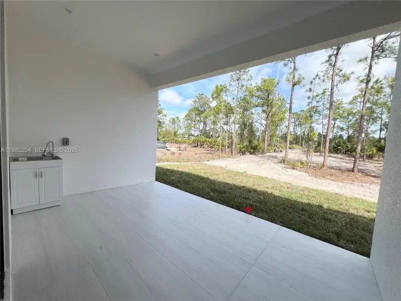 Exterior details and patio area of a home in , Naples (Image 4). Exterior details and patio area of a home in , Naples (Image 4).