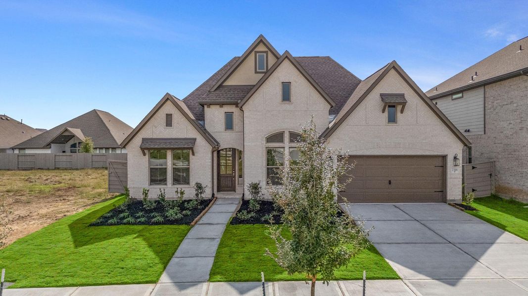 Front exterior of a new home in Pomona, Manvel, TX, highlighting curb appeal (Image 21).
