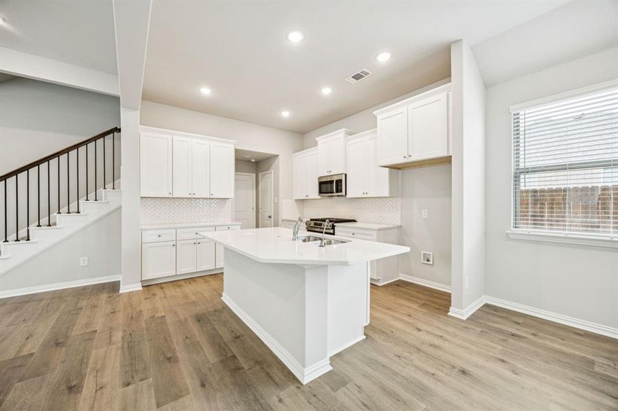 Furnished interior view inside a new home in Bel Air Village, Sherman (Image 5). Furnished interior view inside a new home in Bel Air Village, Sherman (Image 5).
