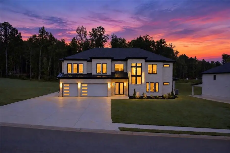 Front exterior of a new home in , Auburn, GA, highlighting curb appeal (Image 2). Front exterior of a new home in , Auburn, GA, highlighting curb appeal (Image 2).