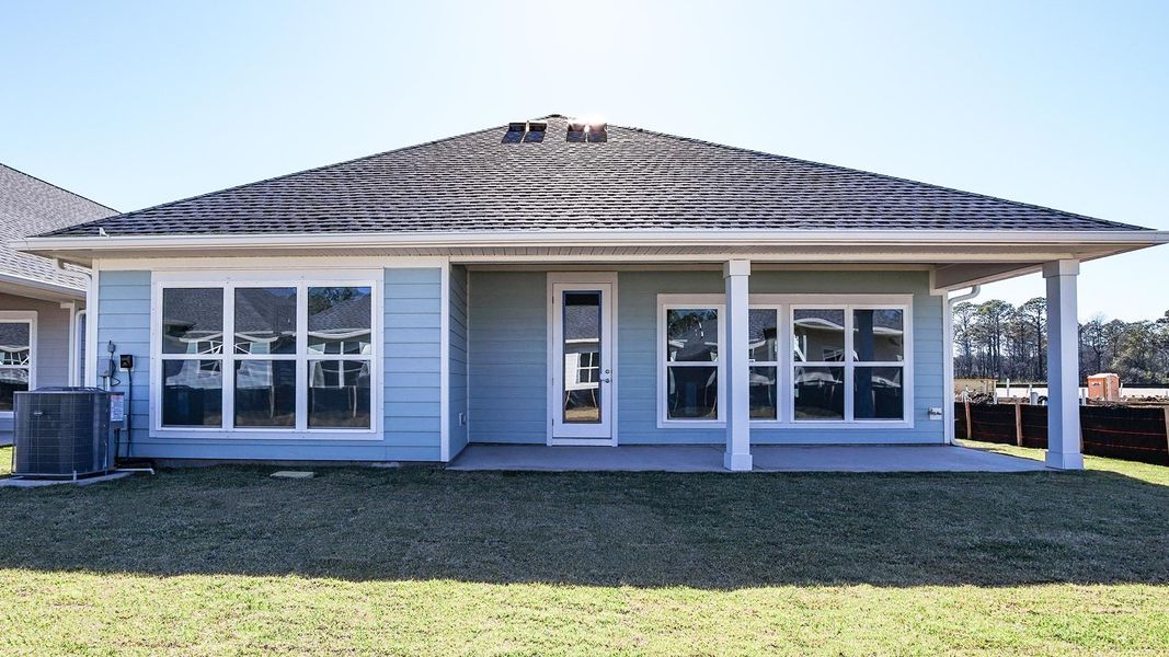 Representative exterior photo of a completed home built from the Jubilee by D.R. Horton in Breakfast Point East Phase II, Panama City Beach, FL (Image 23).