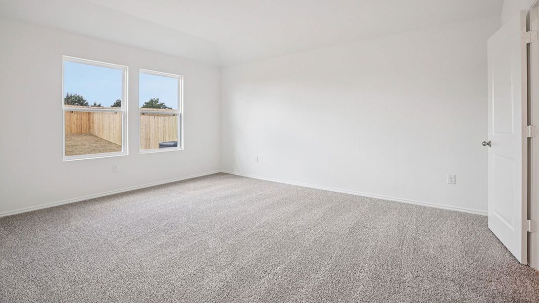 Spacious, unfurnished interior of a new home in Carillon, Manor (Image 25).