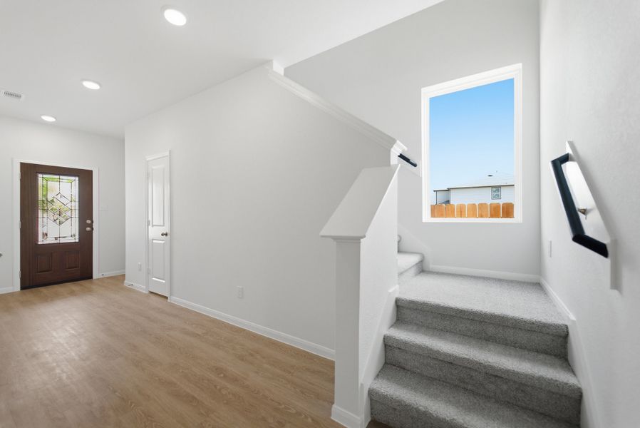 Spacious, unfurnished interior of a new home in The Pines at Seven Coves, Willis (Image 24).