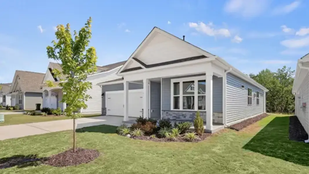 Front exterior of a new home in The Villas at Galvins Ridge, Sanford, NC, highlighting curb appeal (Image 17).