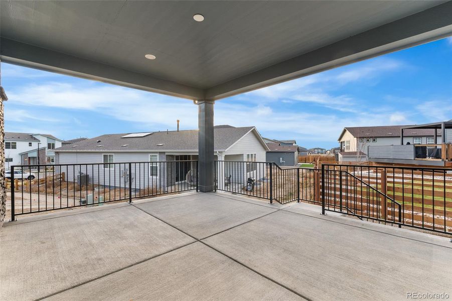 Exterior details and patio area of a home in The Aurora Highlands, Aurora (Image 3).