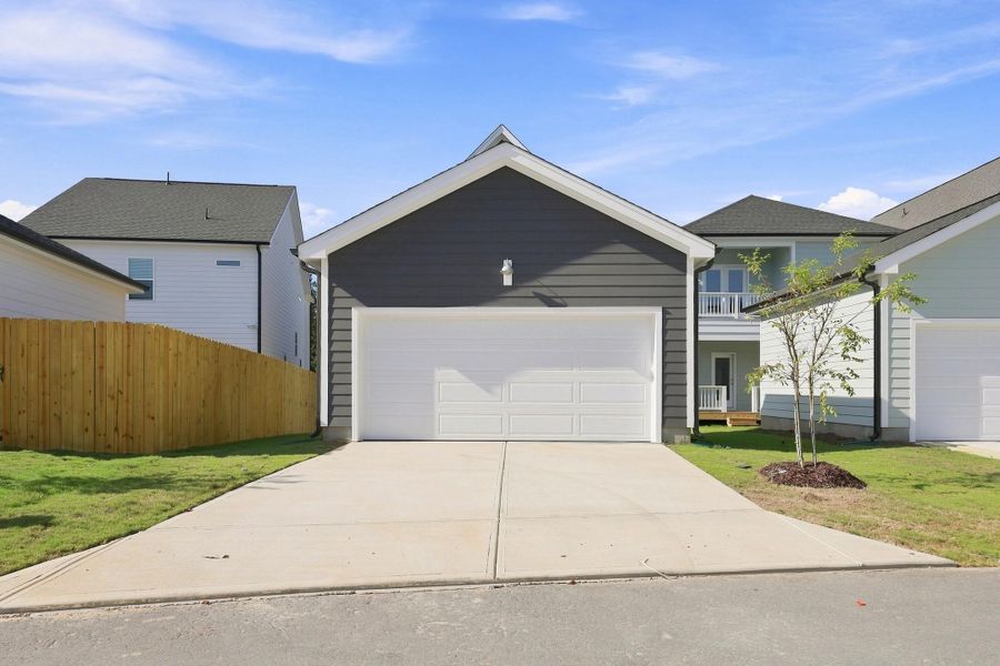 Front exterior of a new home in Wendell Falls, Wendell, NC, highlighting curb appeal (Image 18).