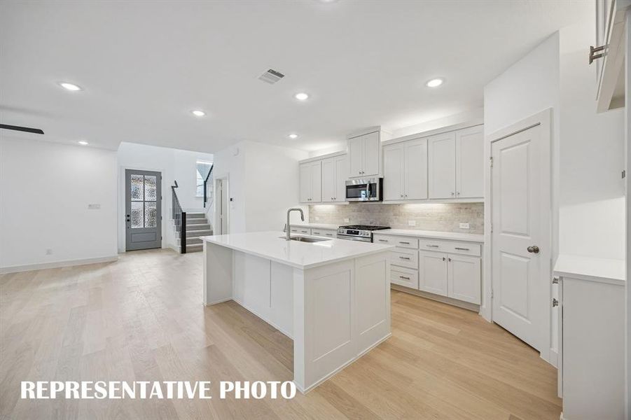 The chef in the family will never be left out of the party in this fantastic floor plan! REPRESENTATIVE PHOTO The chef in the family will never be left out of the party in this fantastic floor plan! REPRESENTATIVE PHOTO