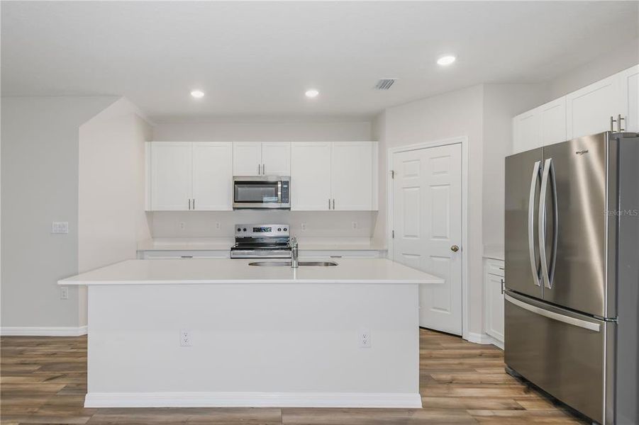 Furnished interior view inside a new home in Pasadena Woods, Dade City (Image 4).