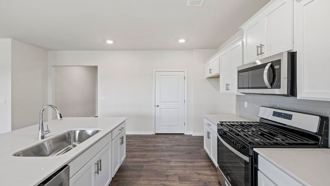 Furnished interior view inside a new home in Sherwood Gardens, Landrum (Image 8).