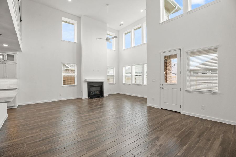 Impressive great room with cozy fireplace (*Photo not of actual home and used for illustration purposes only.)
