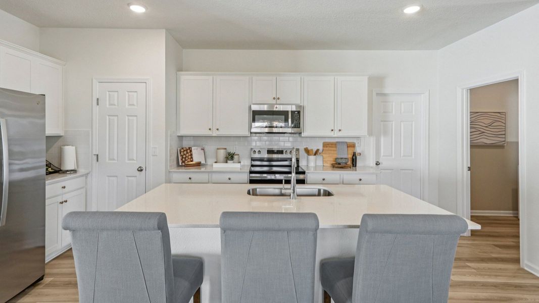 Merritt Floorplan Kitchen by DRB Homes in the Panther Creek Community, Jacksonville, FL