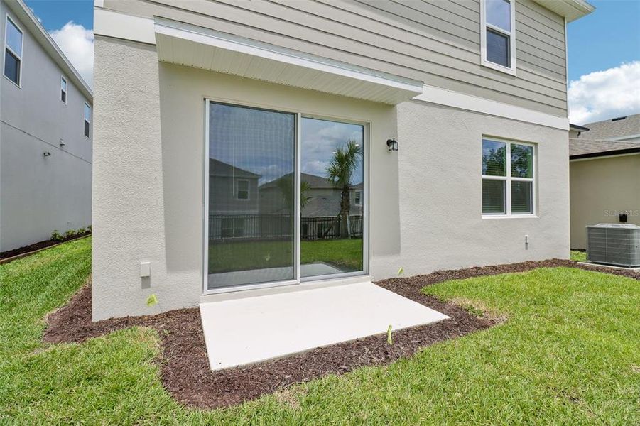 Exterior details and patio area of a home in Beresford Woods, Deland (Image 3).