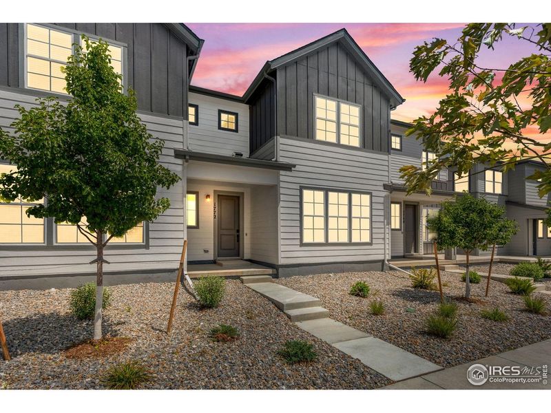 Front exterior of a new home in , Berthoud, CO, highlighting curb appeal (Image 21).