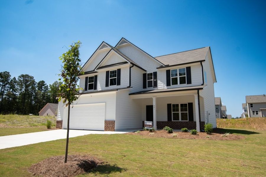 Front exterior of a new home in Creekside Landing, Dallas, GA, highlighting curb appeal (Image 26).
