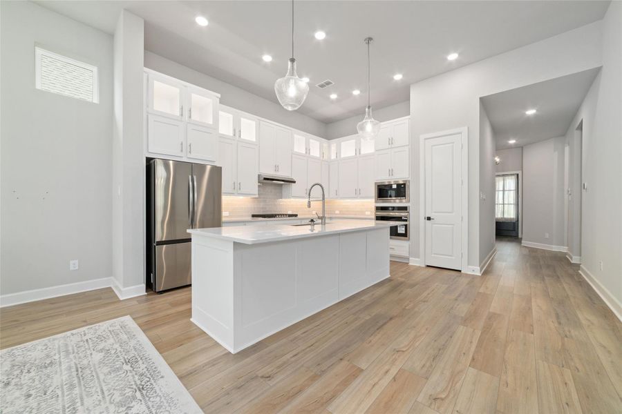 Furnished interior view inside a new home in Harvest Green - Reserve Collection, Richmond (Image 9).