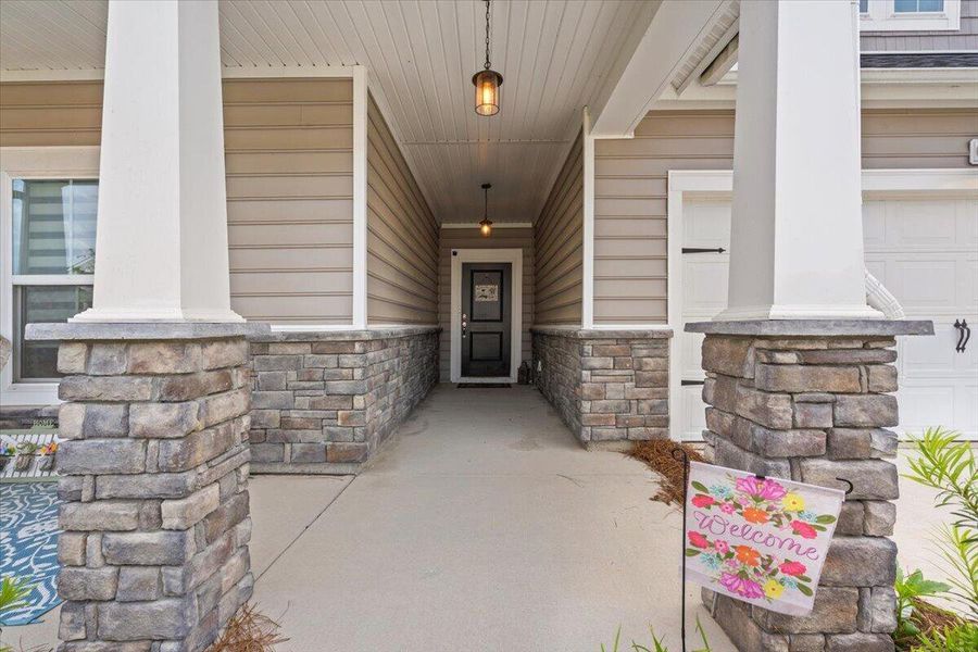 Exterior details and patio area of a home in Horizons at Summers Corner | 55+, Summerville (Image 32).