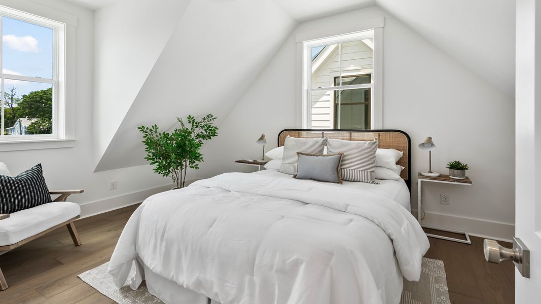 Secondary bedroom in the Sullivan home plan featuring stylish finishes and versatile living space.